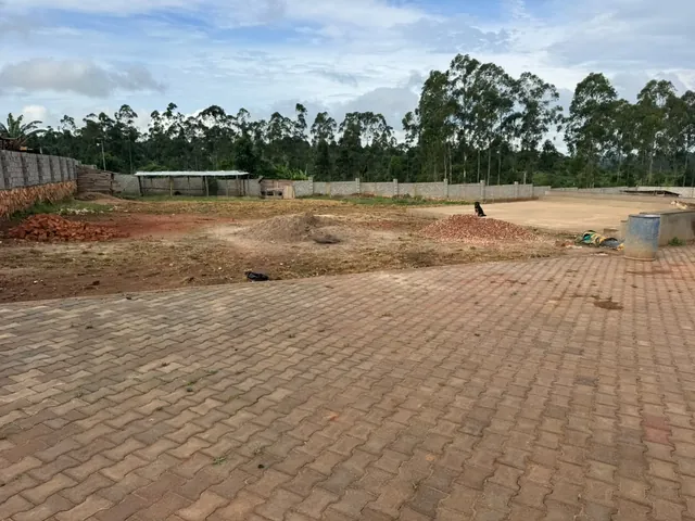 Courtyard, materials and a low platform by the wall.